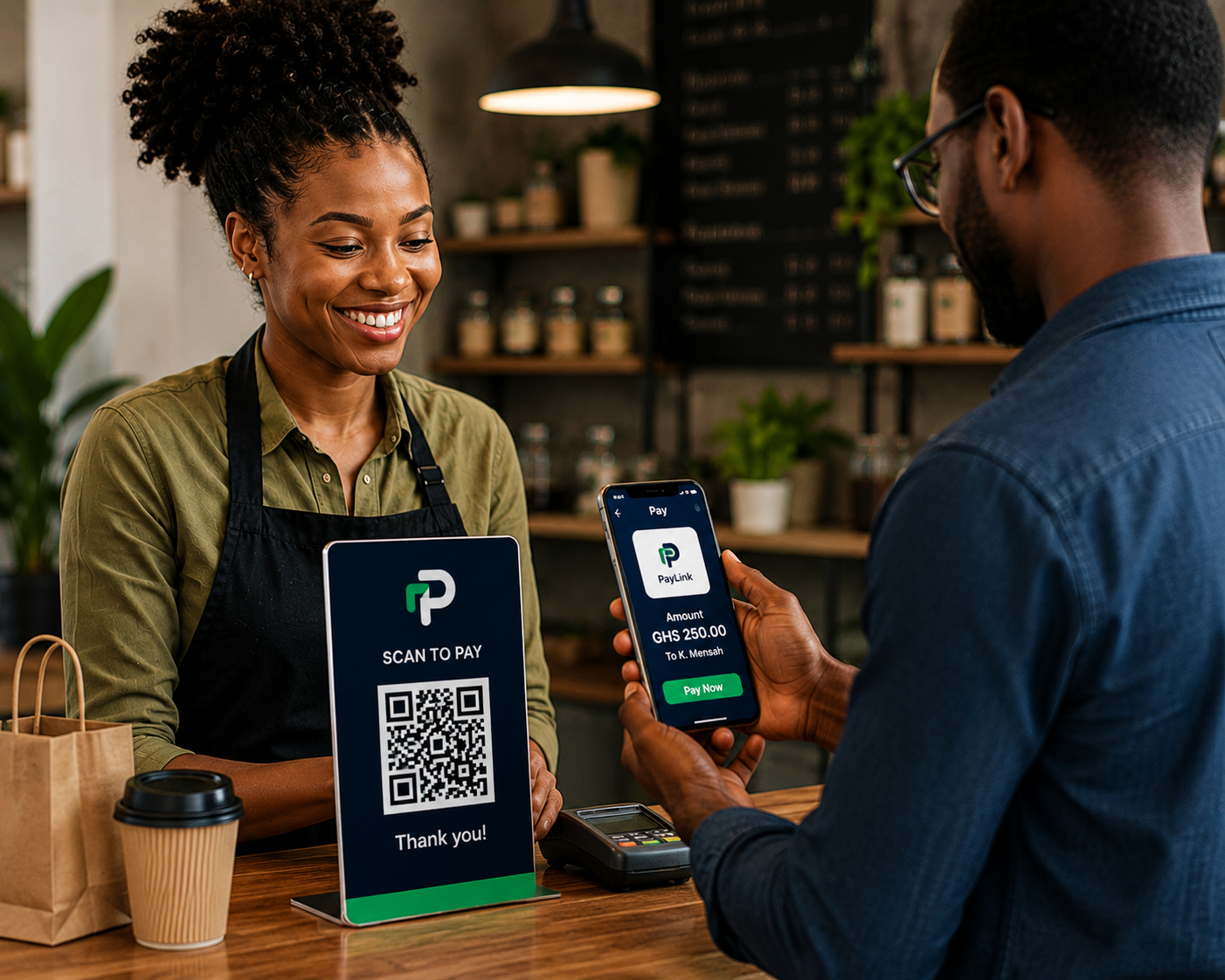 A barista in Ghana receiving GHS 250.00 from K. Mensah via QRPayLink QR scan